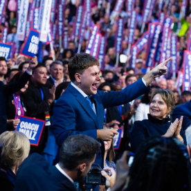 Gus Walz cheers for his father, Minnesota Gov. Tim Walz, Democratic vice presidential nominee, on the third night of the Democratic National Convention at the United Center in Chicago, Ill., on Wednesday, August 21, 2024.