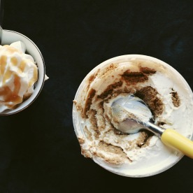 Japanese cheesecake yogurt made with biscoff cookies and Greek yogurt, topped with whipped cream and caramel.
