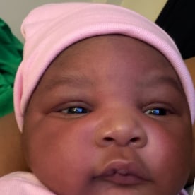 A Bronx woman who gave birth with the help of police outside her building honored one officer by naming her daughter after him.