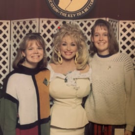 Elizabeth McKeever, Dolly Parton and Mary Anne Hitt celebrate the completion of the Dollywood Foundation Buddy Program in 1992.
