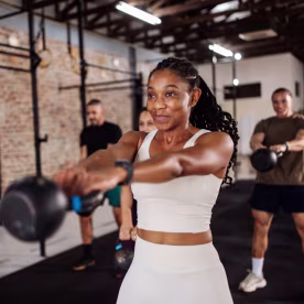 friends doing kettlebell workout