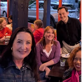 Host Joanna Mutch and attendees at the "Great British Bake Off"watch party in Washington, D.C.