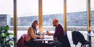 Image::Image: Mette Brathen, teacher, and her partner Henning Velo, an engineer, both 45, have a late breakfast in a caf? in the working class T?yen neighborhood.|for NBC News