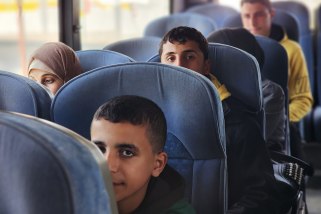 Buses carrying the sick and injured Palestinians set out for Egypt