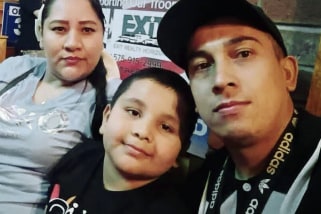 Deiver with his parents.