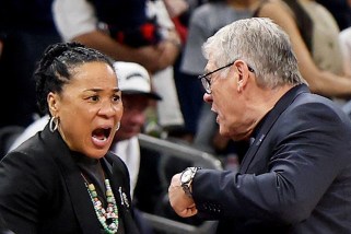 Dawn Staley of the South Carolina Gamecocks and head coach Geno Auriemma of the UConn Huskies.