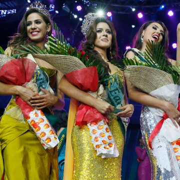 Winners for the Miss Earth 2016 pose for photographers following the grand coronation night on Oct. 29, 2016, at the Mall of Asia Arena in suburban Pasay city southeast of Manila, Philippines. (Photo by Bullit Marquez/AP)