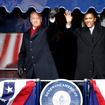 Image: U.S. President-elect Barack Obama is joined by U.S. Vice President-elect Joe Biden on the back of a train car during their whistle stop tour in Wilmington, Delaware, Jan. 17, 2009.