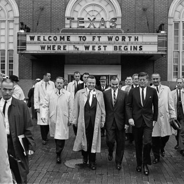 Image: President John F. Kennedy, front, right, exits the Hotel Texas in Fort Worth