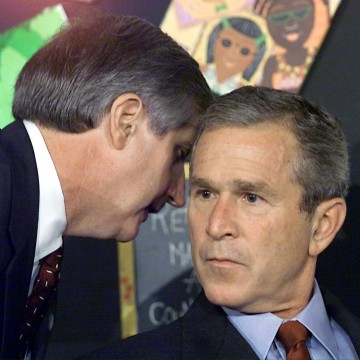 President Bush is interrupted at 9:07 a.m. during a school visit in Sarasota, Fla., by Andrew Card, his chief of staff, and informed that a second plane had hit the World Trade Center.