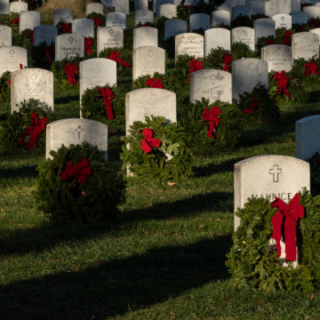 Volunteers Place Holiday Wreaths On Arlington National Cemetery Headstones