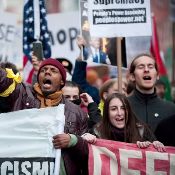 Image: Protesters demonstrate near the parade route where President Trump will walk after taking the oath of office in Washington, D.C. on Jan. 20.