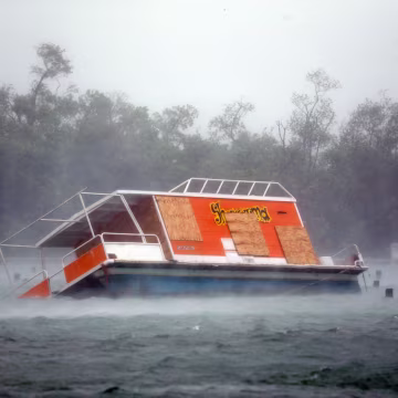Image: A floundered boat is shown at the Haulover Marine Center in Haulover Park in North Miami Beach on Sept. 10, 2017.
