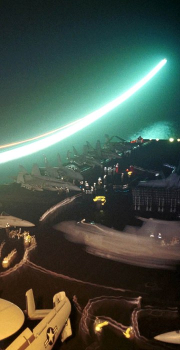 STREAK OF LIGHT AS PLANE TAKES OFF FROM USS ENTERPRISE