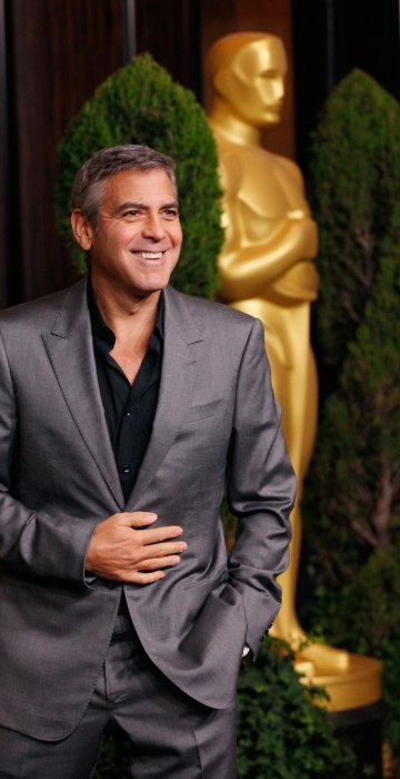 Image: Actor George Clooney, best actor nominee for his role in \"The Descendants\", arrives at the 84th Academy Awards nominees luncheon in Beverly Hills