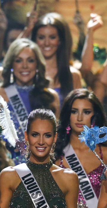 Image: Miss USA contestants take the stage during the 2014 Miss USA beauty pageant in Baton Rouge, Louisiana