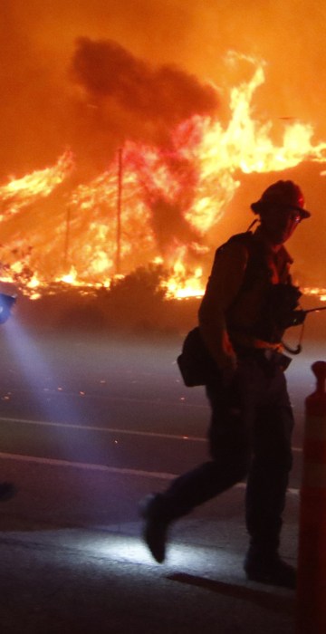 Image: Ventura County firefighters battle the Solimar brush fire that started early Saturday morning in Ventura County