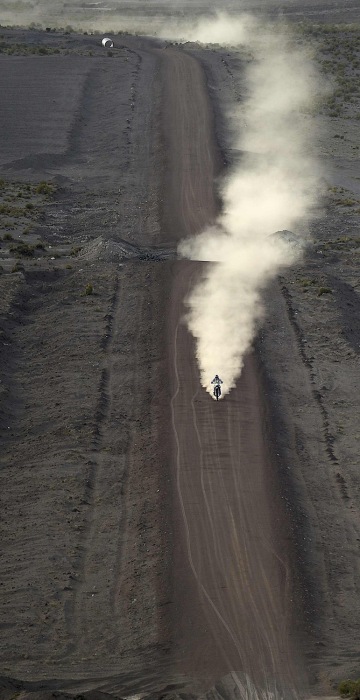 Image: Toby Price rides his motorcycle during Stage 6 of the Dakar 2016