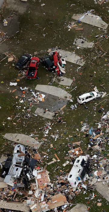 Image: A tornado reportedly flipped campers and crushed cars in the Sugar Hill RV Park