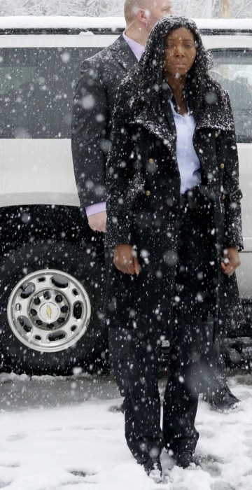 Image: Secret Service agents are covered in snow