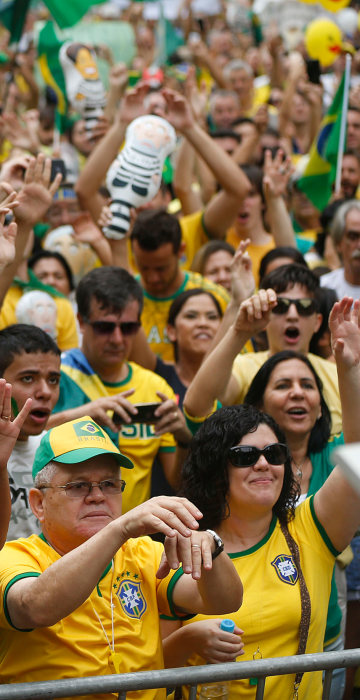 Image: Demonstrators gather during a protest
