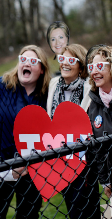 Image: Supporters of Democratic U.S. presidential candidate Hillary Clinton pose for a selfie photograph outside the Grafflin School where Clinton voted in the New York U.S. presidential primary election in Chappaqua