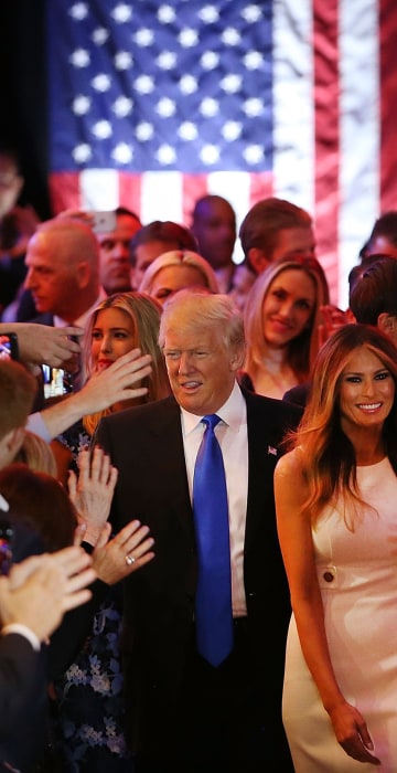 Image: Donald Trump and his wife Melania Trump arrive to speak to supporters at Trump Tower