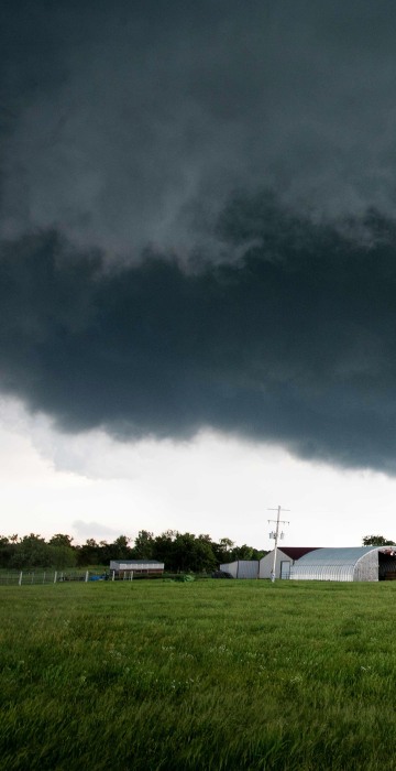 Image: A tornado rips through a residential area after touching down south of Wynnewood, Oklahoma
