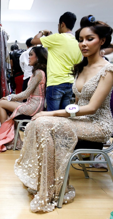 Image: Beauty contestants prepare backstage before the final of the annual Miss Tiffany's Universe 2016 transvestite contest in the beach resort town of Pattaya