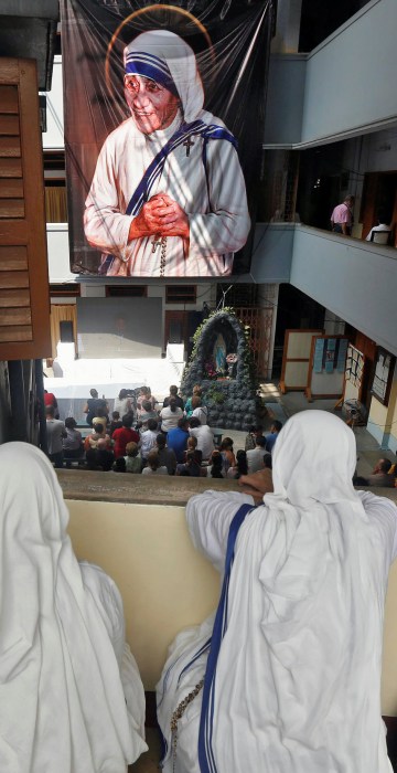 Image: Nuns from the Missionaries of Charity in Kolkata, India, watch a live broadcast of the canonisation of Mother Teresa