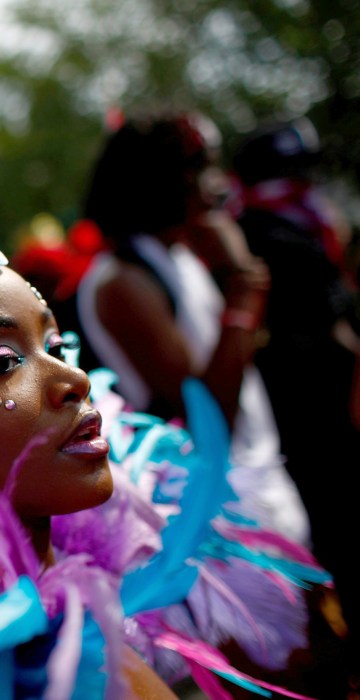 Image: Participants dance during the West Indian Day Parade in the Brooklyn borough of New York