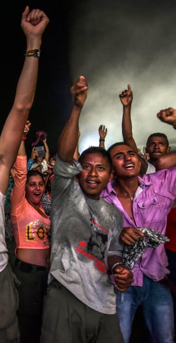 Image: Members of the Revolutionary Armed Forces of Colombia guerrilla dance during a cultural event