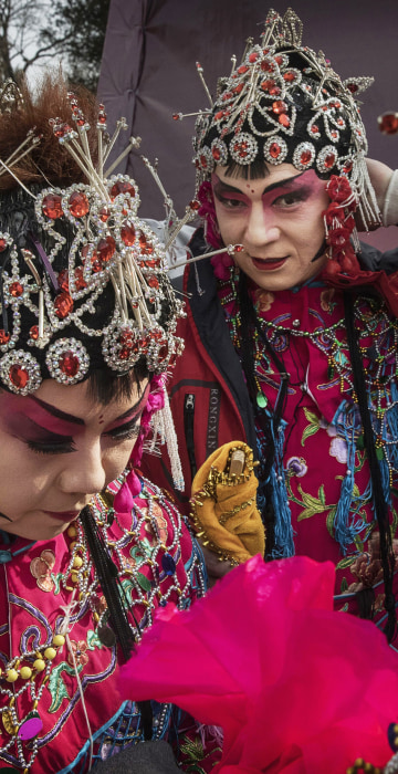 Image: Chinese dancers wear costumes after performing at a fair on the second day of the Chinese Lunar New Year on Jan. 29 in Beijing, China.