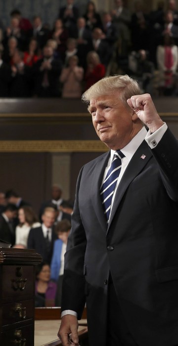 Image: US President Donald J. Trump arrives to deliver his first address to a joint session of Congress from the floor of the House of Representatives in Washington