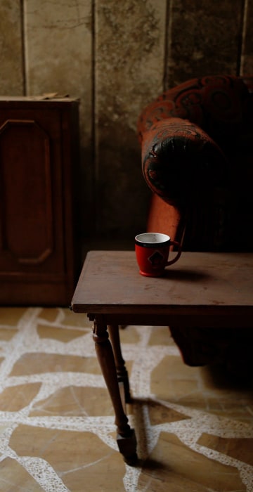 Image: A coffee mug is seen on a table at a compound used as a prison by Islamic State militants