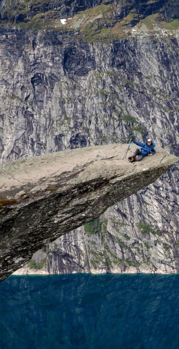 Image: Tourists visit the \"Trolltunga\" rock in Norway