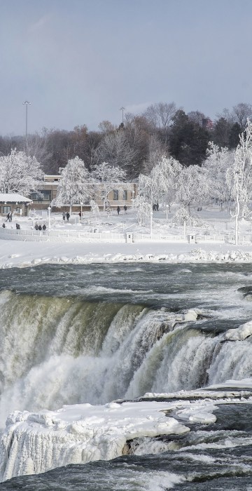 Image: A frozen Niagara Falls is seen from Stedman's Bluff on Goat Island