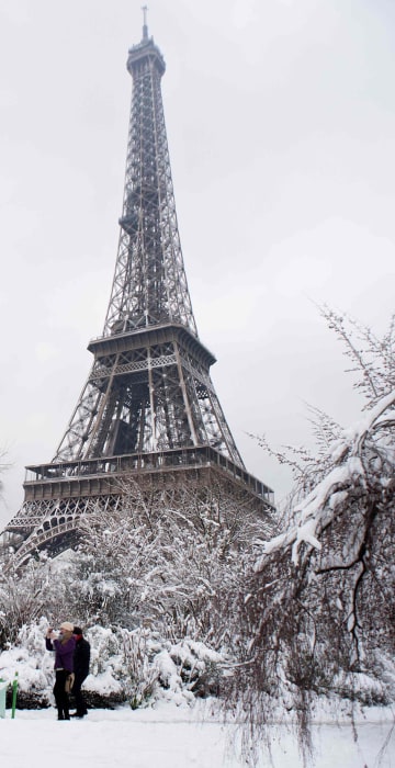 People walk through the Champ de Mars garden on Feb. 7.