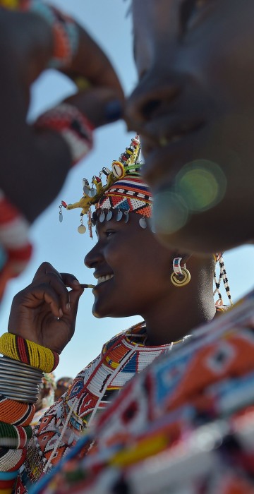 Image: Samburu women of the Lorubai traditional dance group participate in a peace marathon