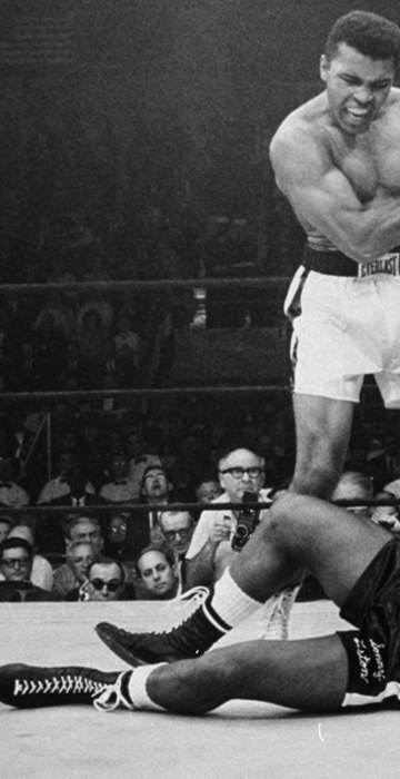 Image: Heavyweight champion Muhammad Ali stands over fallen challenger Sonny Liston, shouting and gesturing shortly after dropping Liston with a short hard right to the jaw on May 25, 1965, in Lewiston, Maine.