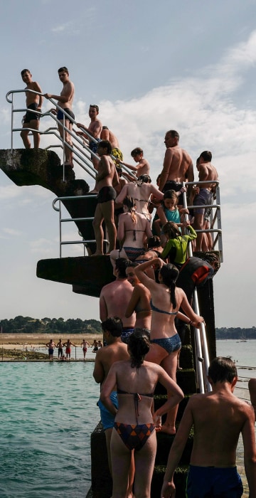 Image: TOPSHOT-FRANCE-WEATHER-HEAT-TOURISM-BEACH