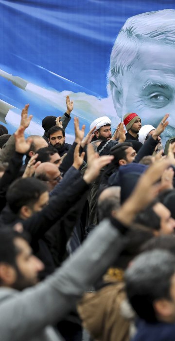 Protesters demonstrate over the U.S. airstrike in Iraq that killed Iranian Revolutionary Guard Gen. Qassem Soleimani in Tehran, Iran, on Jan. 4, 2020. Iran vowed "harsh retaliation" for the U.S. airstrike near Baghdad's airport that killed Tehran's top general and the architect of its interventions across the Middle East, as tensions soared in the wake of the targeted killing.