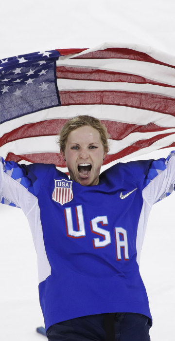 Image: Jocelyne Lamoureux-Davidson celebrates after Team USA defeated Canada in a 3-2 victory during the gold medal match on Feb. 22, 2018.