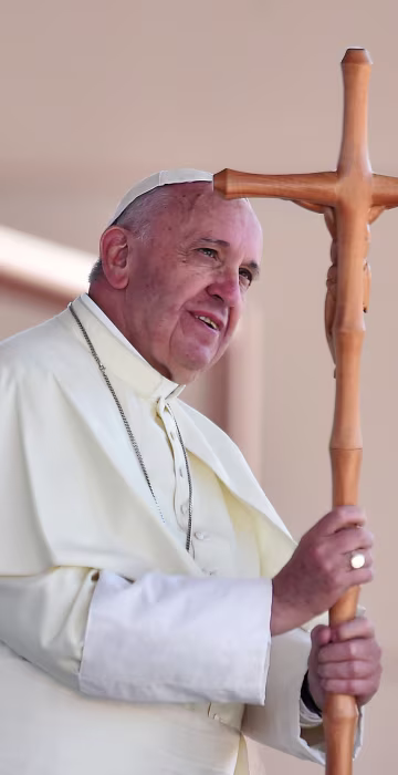 Image: Pope Francis receives a cross made by an inmate during his visit to the CeReSo n. 3 penitentiary