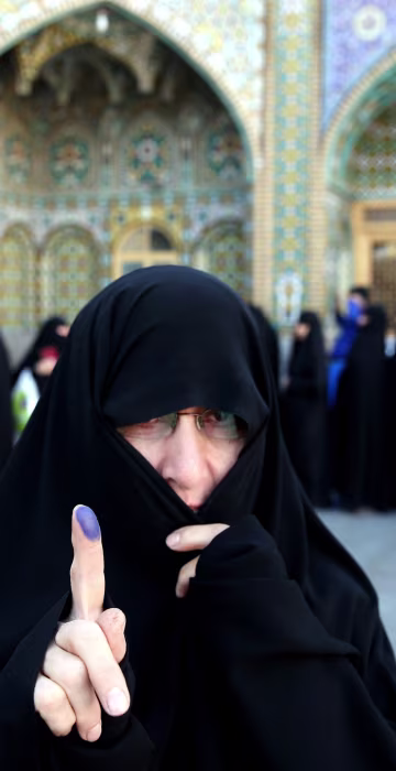 Image: Iranian Elections Woman Fingerprint Cover