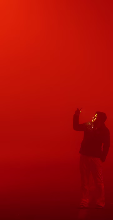 Image: A Palestinian man takes a selfie during foggy weather in Gaza City