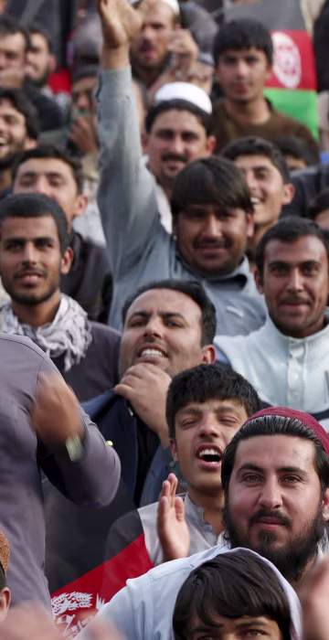 Image: Afghan cricket fans welcome Afghanistan's national cricket team, after their Twenty20 world cup tournament, in Kabul