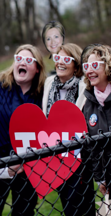 Image: Supporters of Democratic U.S. presidential candidate Hillary Clinton pose for a selfie photograph outside the Grafflin School where Clinton voted in the New York U.S. presidential primary election in Chappaqua