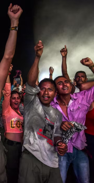 Image: Members of the Revolutionary Armed Forces of Colombia guerrilla dance during a cultural event