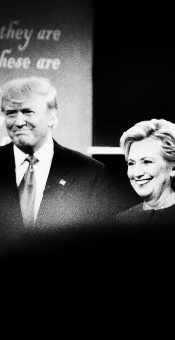 Republican presidential nominee Donald Trump and Democratic presidential nominee Hillary Clinton arrive on stage for the first presidential debate.